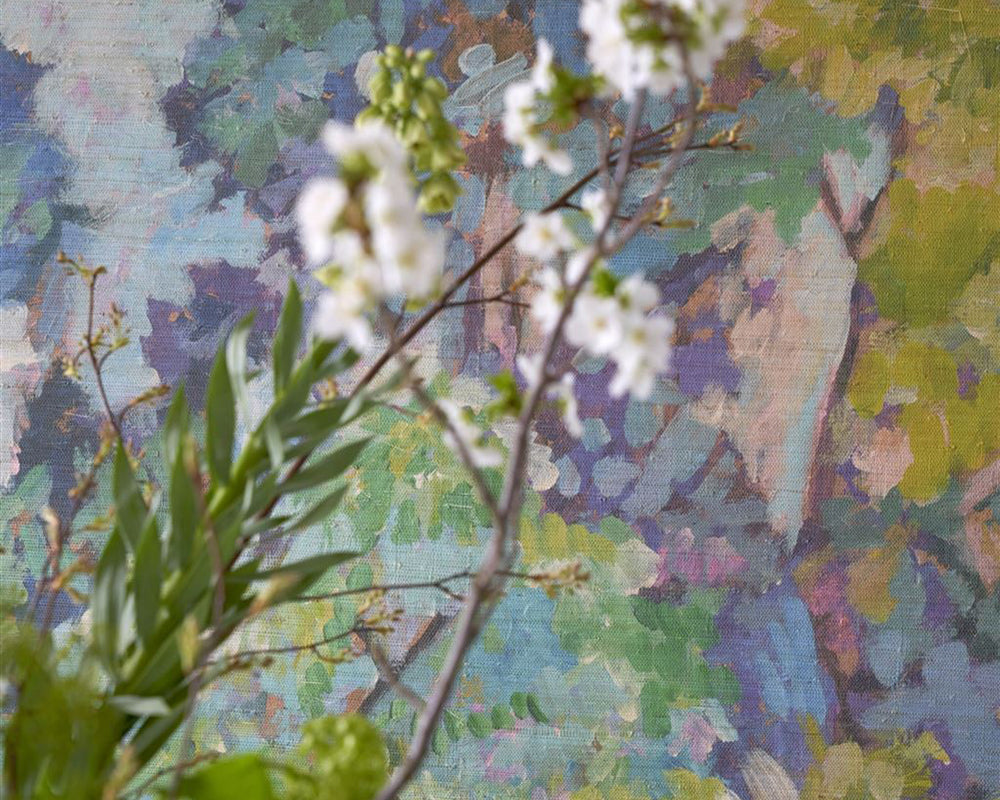 Designers Guild Foret Impressionniste Grasscloth Wallpaper in detail behind branches