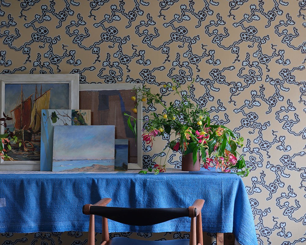 Farrow and Ball Adelaide Wallpaper 6303 in a dining room with flowers and paintings