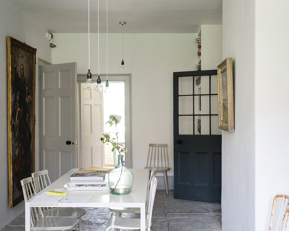 Ammonite 274 paint by Farrow & Ball in a rustic dining room