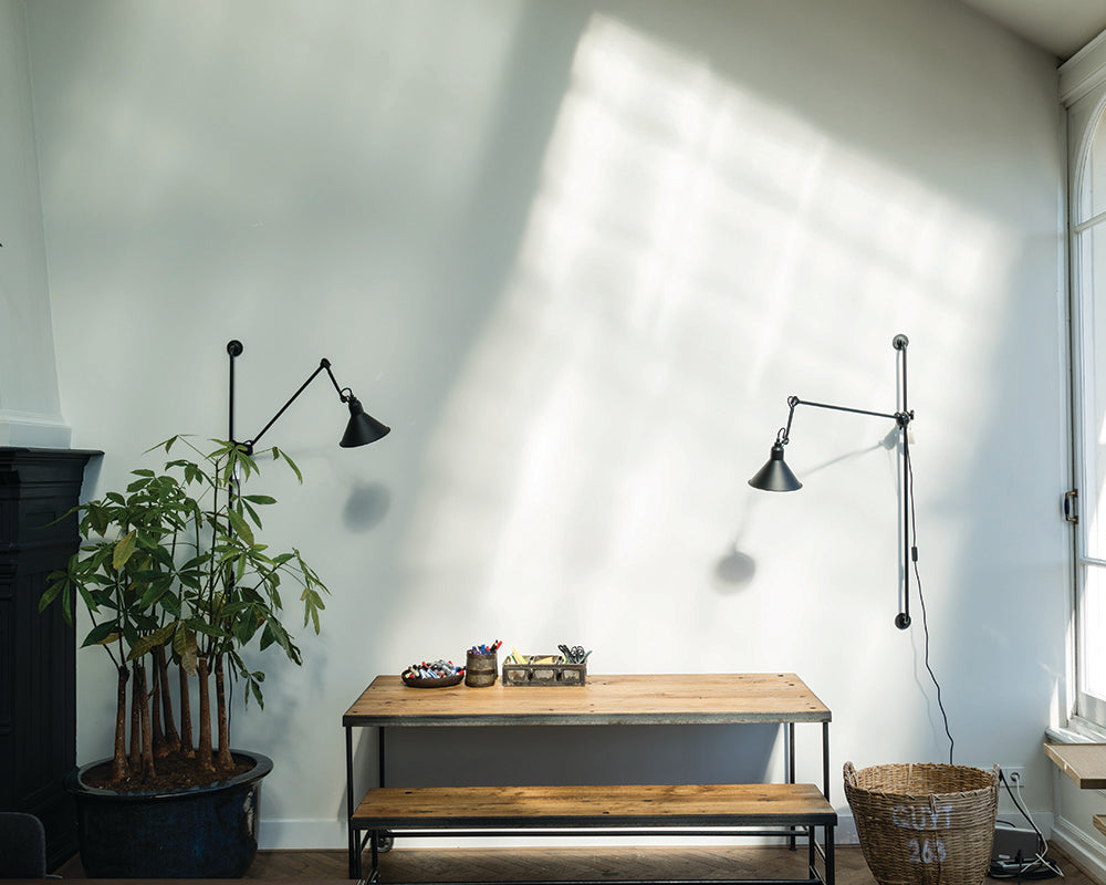 Cornforth White 228 paint by Farrow & Ball in a dinign room with scandi wall lights