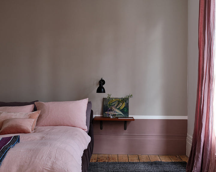 Elephant's Breath 229 paint by Farrow & Ball in a bedroom with colour blocked walls