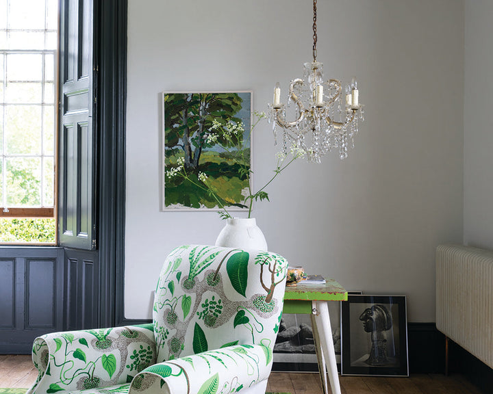 Pavilion Gray 242 paint by Farrow & Ball in a living room with a patterned chair