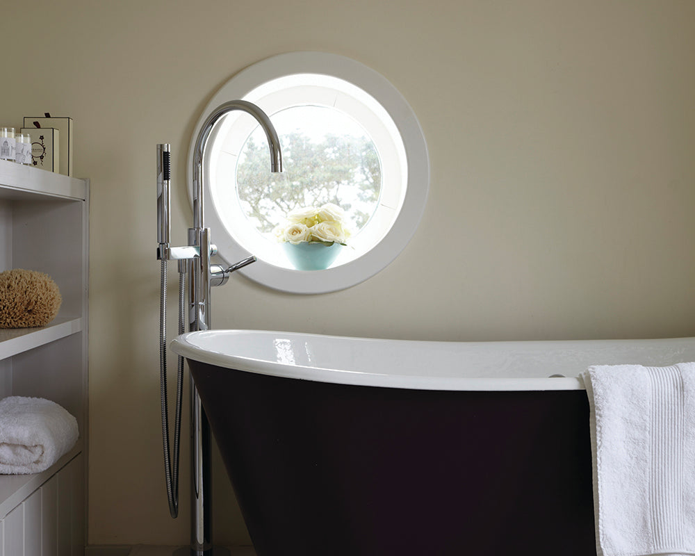 White Tie 2002 paint by Farrow & Ball in a bathroom with a roll top bath