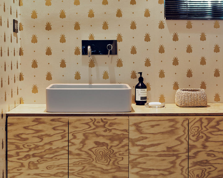 Farrow and Ball Bumble Bee Wallpaper in a bathroom