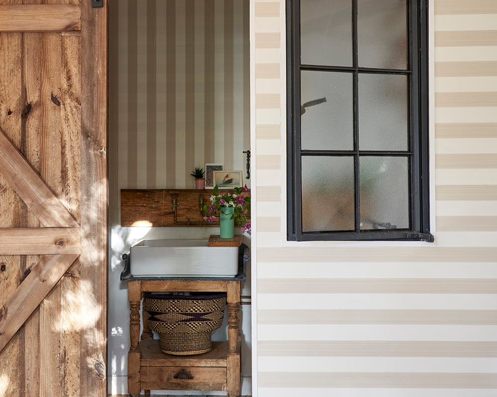 Farrow and Ball Five Over Stripe Wallpaper in a bathroom