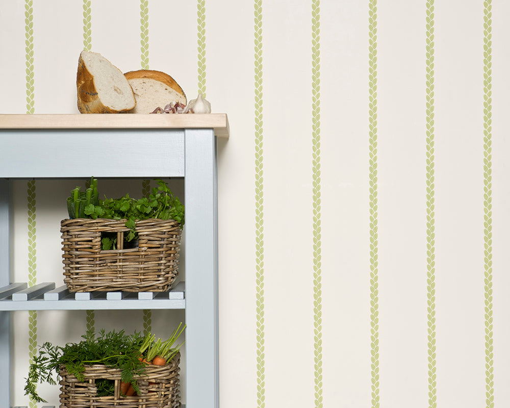 Farrow and Ball Petal Stripe Wallpaper in a room with a cabinet
