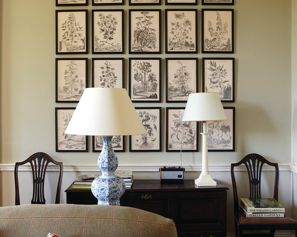 Bone 15 paint by Farrow & Ball in a living room with a picture wall