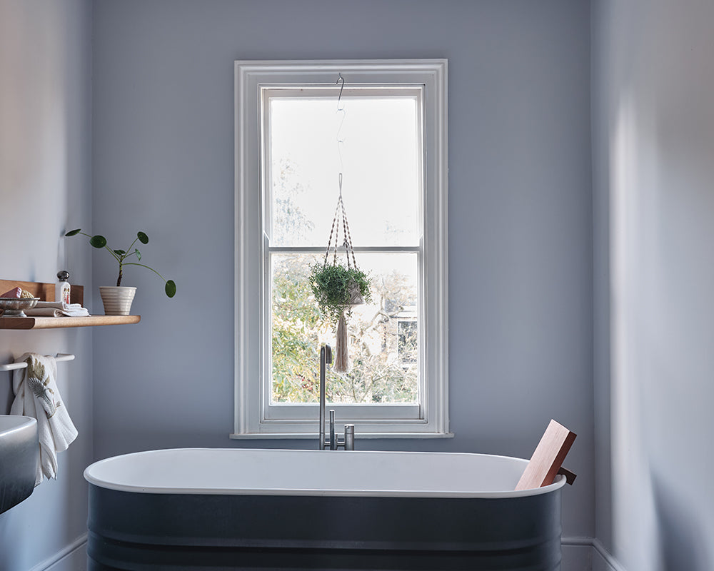 Calluna 270 paint by Farrow & Ball in a bathroom with a traditional bath