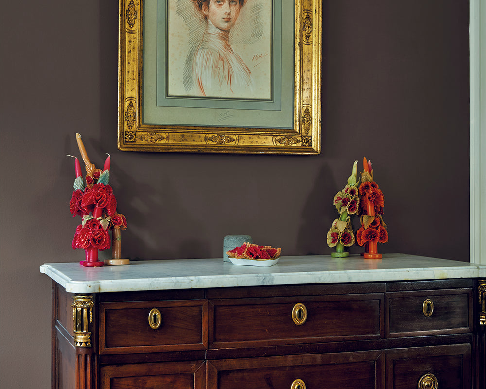 London Clay 244 paint by Farrow & Ball on the walls behind traditional artwork
