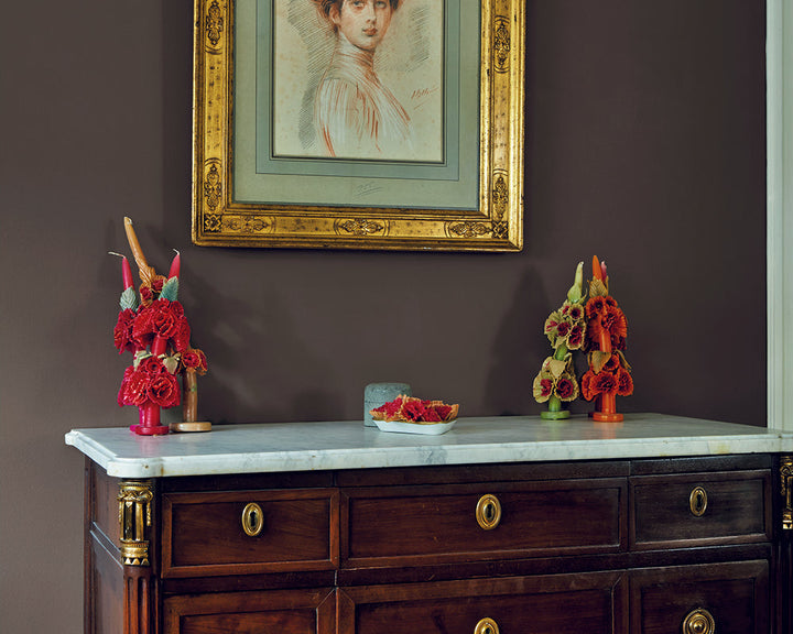 London Clay 244 paint by Farrow & Ball on the walls behind traditional artwork