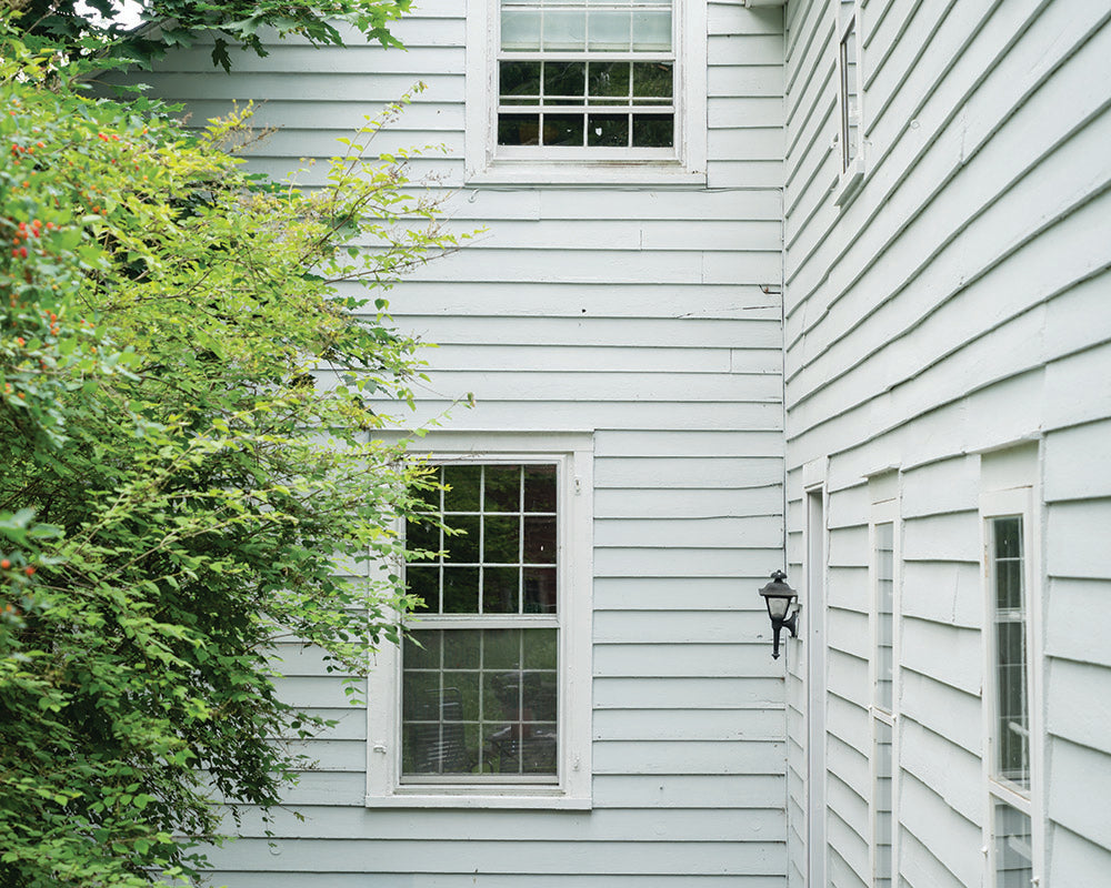 Mizzle 266 paint by Farrow & Ball on exterior cladding of a house
