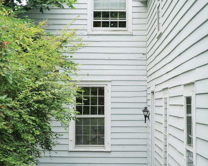 Mizzle 266 paint by Farrow & Ball on exterior cladding of a house