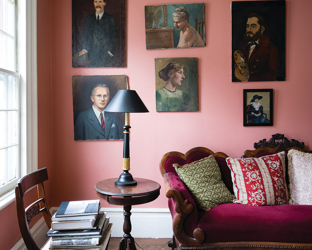 Nancy's Blushes 278 paint by Farrow & Ball on the walls with a picture gallery