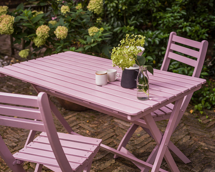 Cinder Rose 246 paint by Farrow & Ball on wooden garden furniture