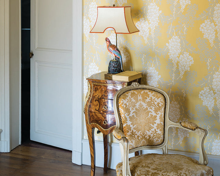 Farrow and Ball Wisteria Wallpaper 2212 with a regency style chair