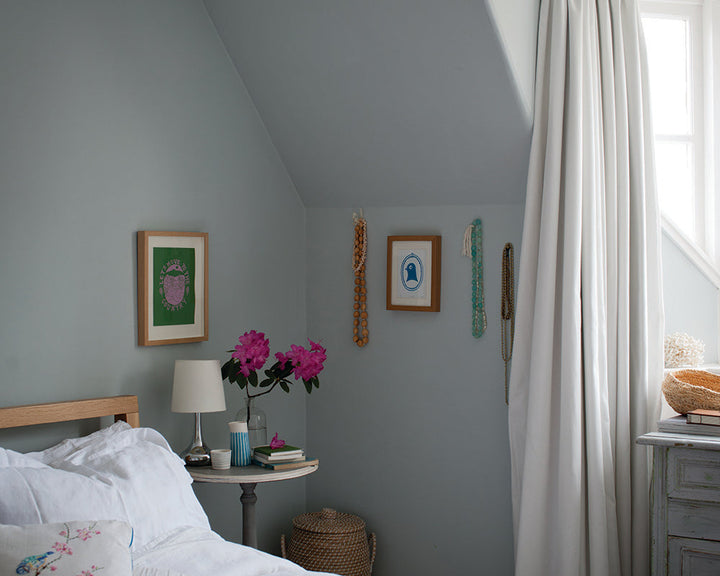 Light Blue 22 paint by Farrow & Ball used on the walls of a bedroom
