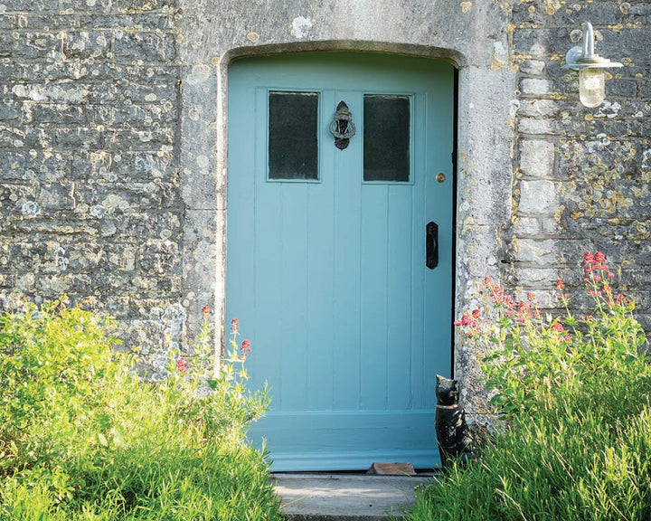 Oval Room Blue 85 paint by Farrow & Ball used on a traditional front door