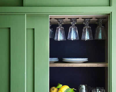 Little Greene Dock Blue 252 Paint in a cupboard