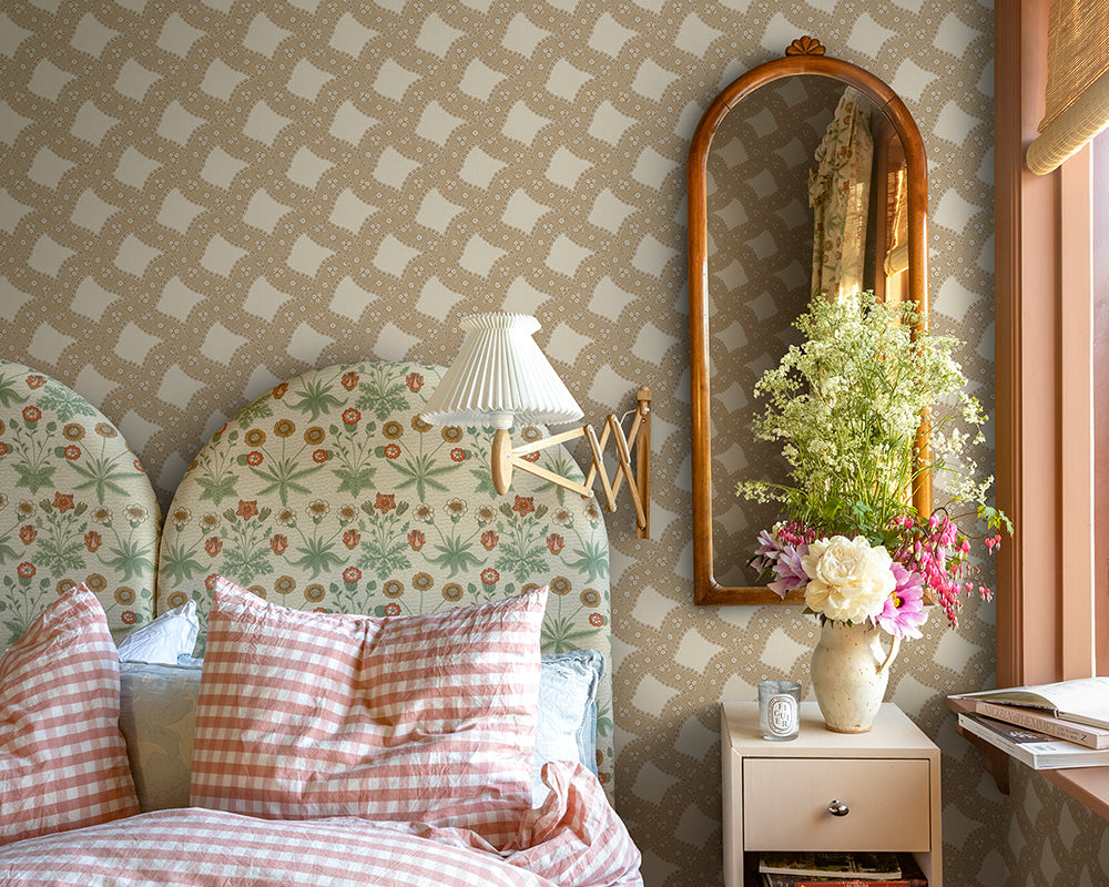 Sandberg Annie Wallpaper in decorative bedroom with floral headboard, checkered pillows, and a mirror on the wall.