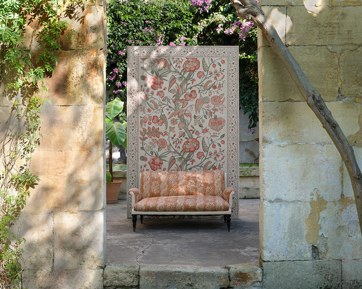 Zoffany Artisan Palampore Wallpaper on a panel behind a fabric sofa