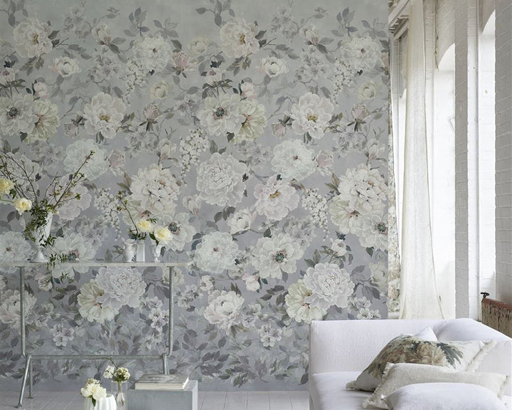 Designers Guild Fleur Blanche Wallpaper on a wall in a living room