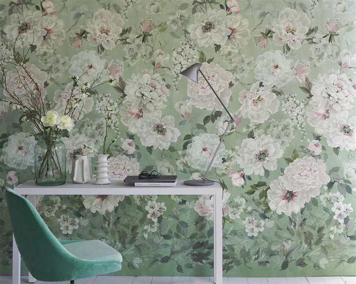Designers Guild Fleur Blanche Wallpaper on a wall behind a desk