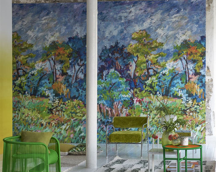 Designers Guild Foret Impressionnniste Wallpaper on a wall in a stylish living room