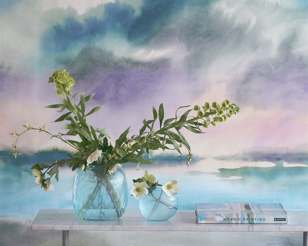 Designers Guild Paysage Marin Wallpaper in detail behind a vase of flowers