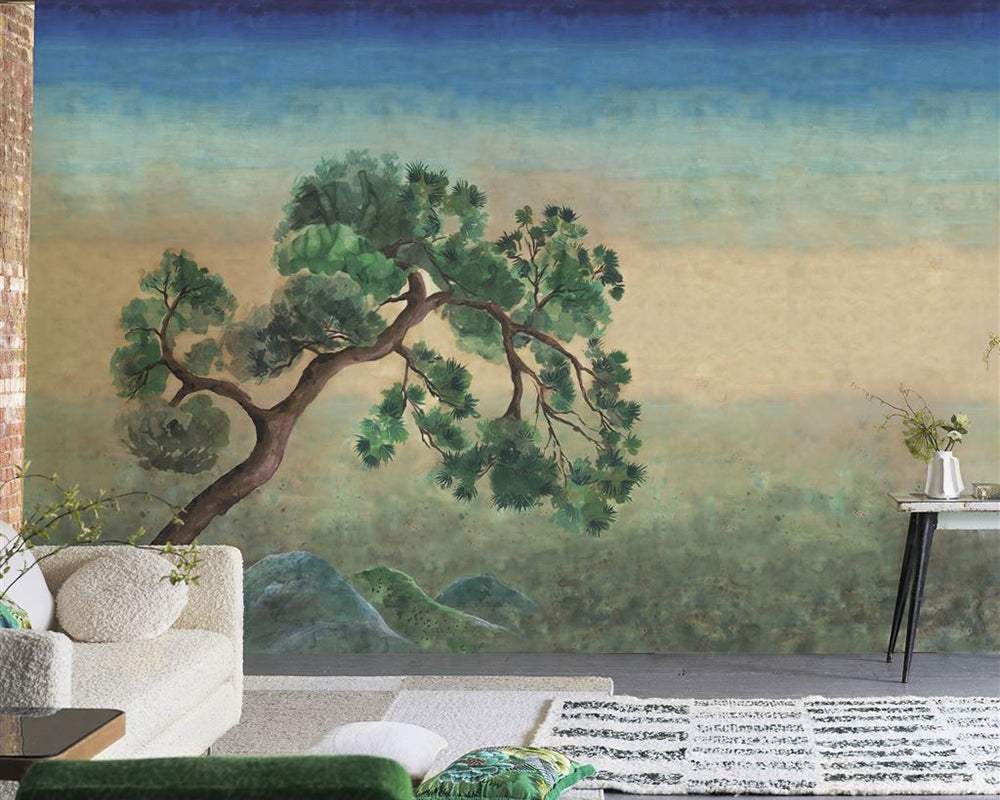 Designers Guild Scene D Arbre Wallpaper on a wall in a living room