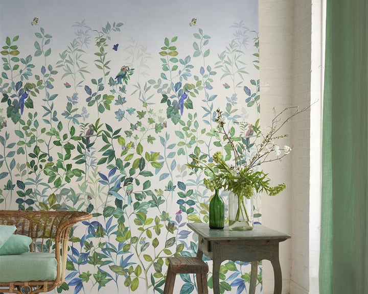 Designers Guild Voliere Wallpaper on a wall in a living room