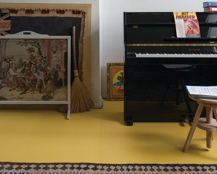 Babouche 223 paint by Farrow & Ball on a wooden floor of a home study