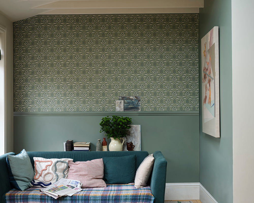 Card Room Green 79 paint by Farrow & Ball used in a living space with wallpaper