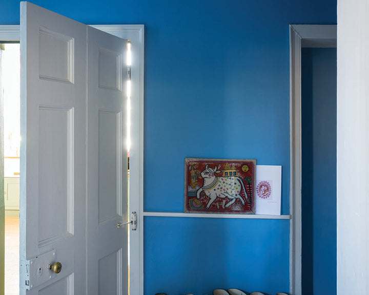 Cook's Blue 237 paint by Farrow & Ball used on the walls of a hallway