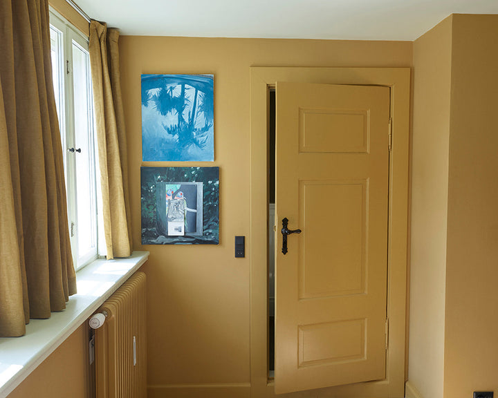 India Yellow 66 paint by Farrow & Ball on walls and woodwork of a hallway