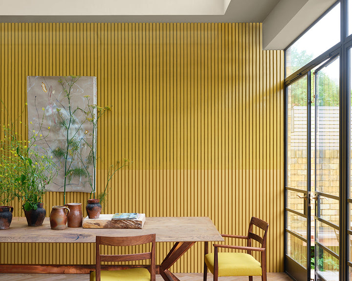 India Yellow 66 paint by Farrow & Ball on cladding in a modern open plan living space
