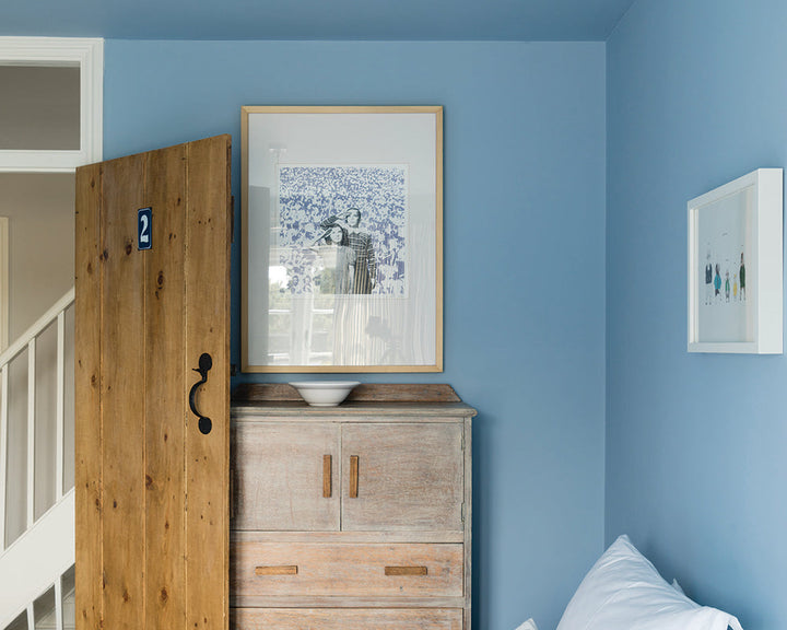 Lulworth Blue 89 paint by Farrow & Ball used in a country style bedroom