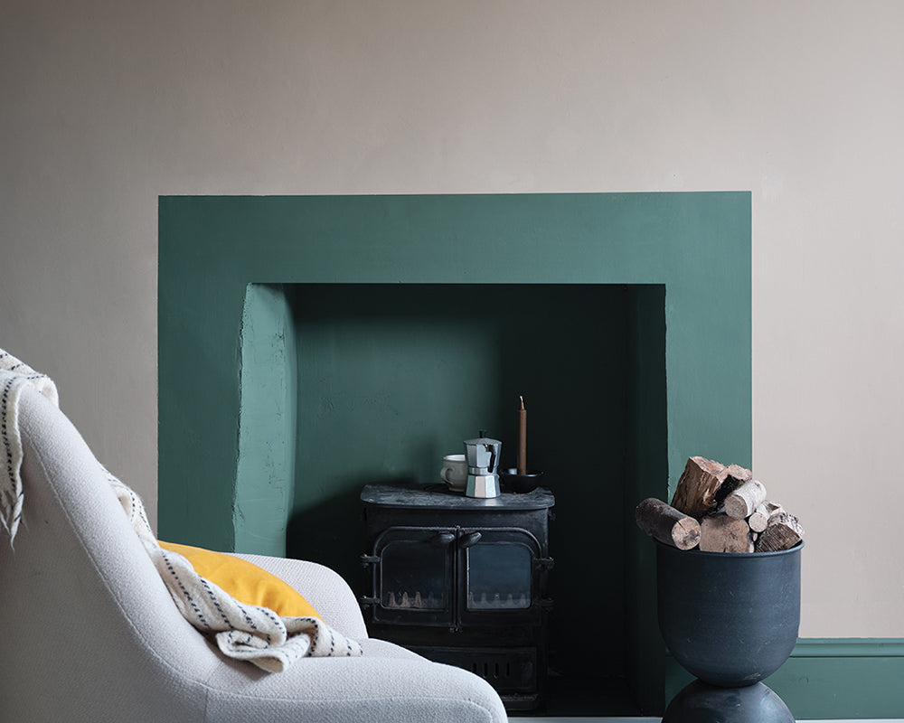 Farrow & Ball Minster Green 224 Paint with a fireplace