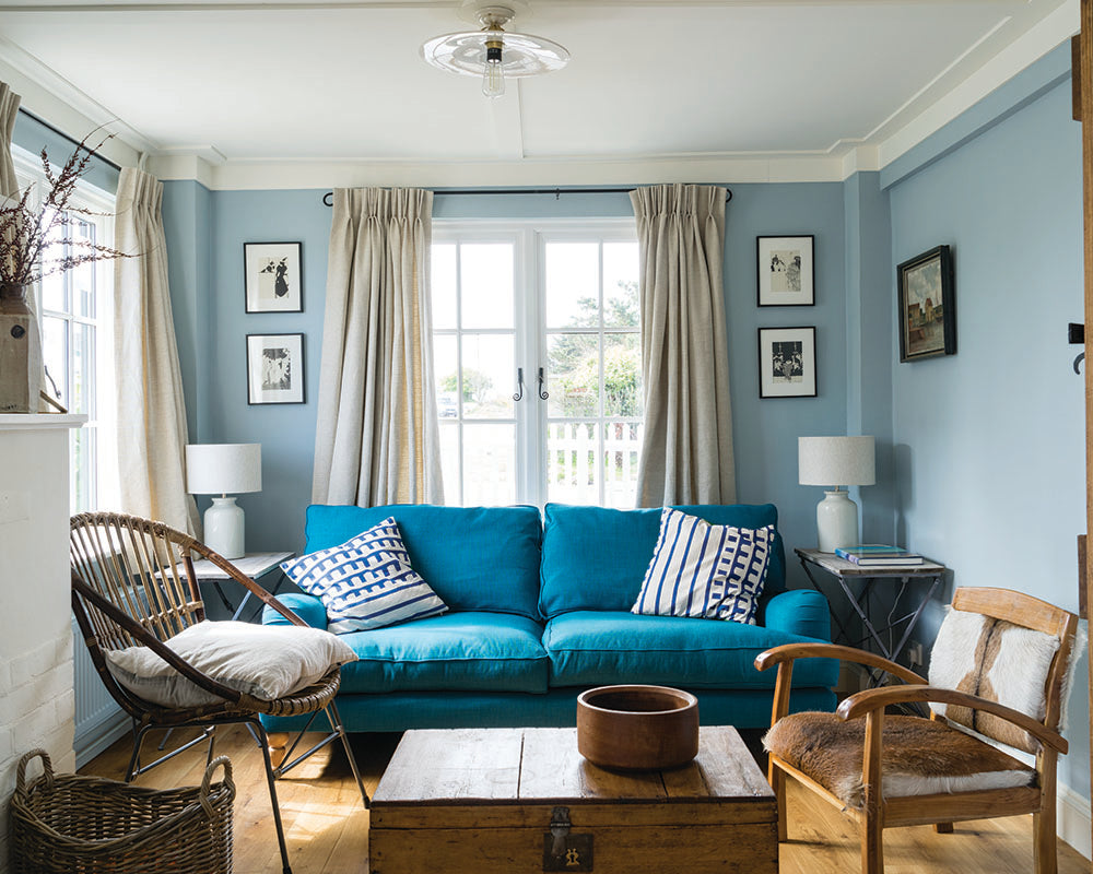 Parma Gray 27 paint by Farrow & Ball used in a cosy living room