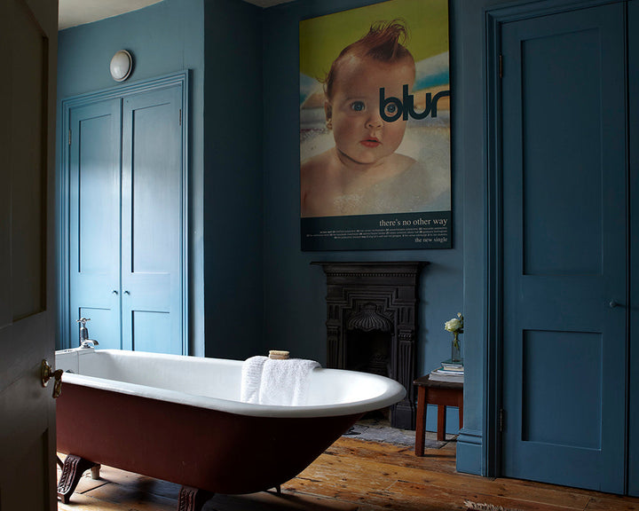 Stone Blue 86 paint by Farrow & Ball on the woodwork in a traditional bathroom