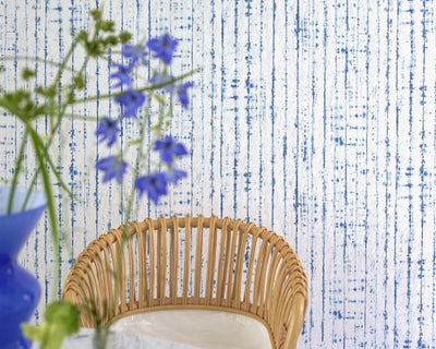 Designers Guild Shiwa Wallpaper with a chair