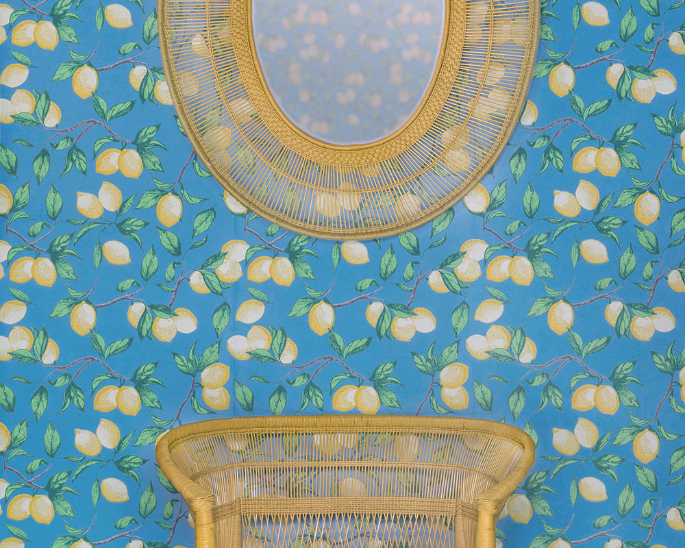 Barneby Gates Capri Lemons Wallpaper on a wall