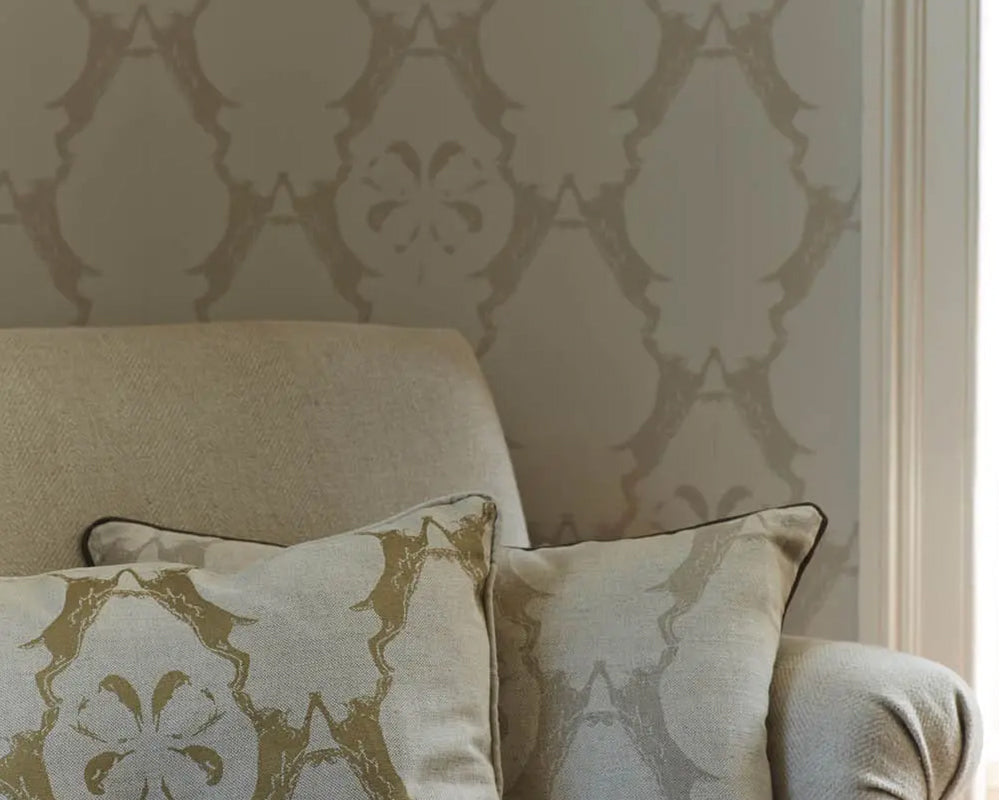 Barneby Gates Boxing Hares Wallpaper in a living room setting - armchair close up