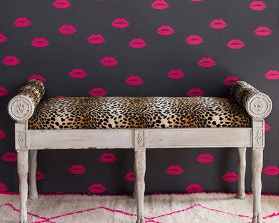 Barneby Gates x Tabitha Webb Lips wallpaper in Hot Pink on Grey with bench