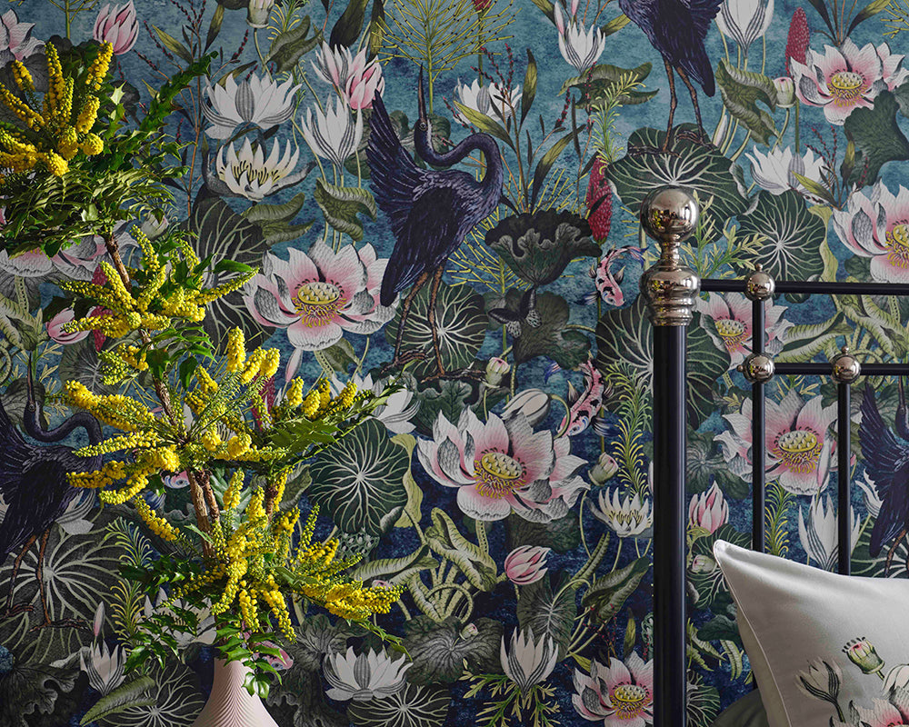 Clarke & Clarke Waterlily Wallpaper behind a bed