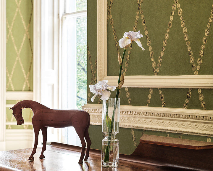 Cole & Son Cammei Wallpaper behind a horse ornament