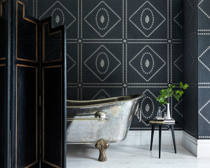 Cole & Son Conchiglie Wallpaper in a bathroom with a roll top bath