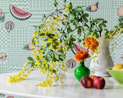 Cole & Son Frutta e Geometrico Wallpaper in a dining room with a table