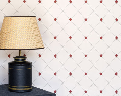 Barneby Gates Diamond Trellis Wallpaper with a lamp