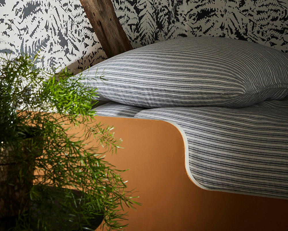 Little Greene Middle Buff 122 Paint on a bedside