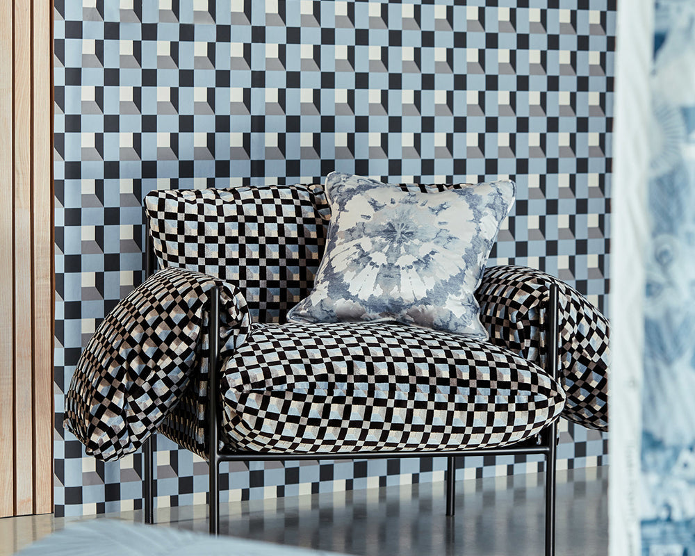 Harlequin Blocks Wallpaper behind a chair